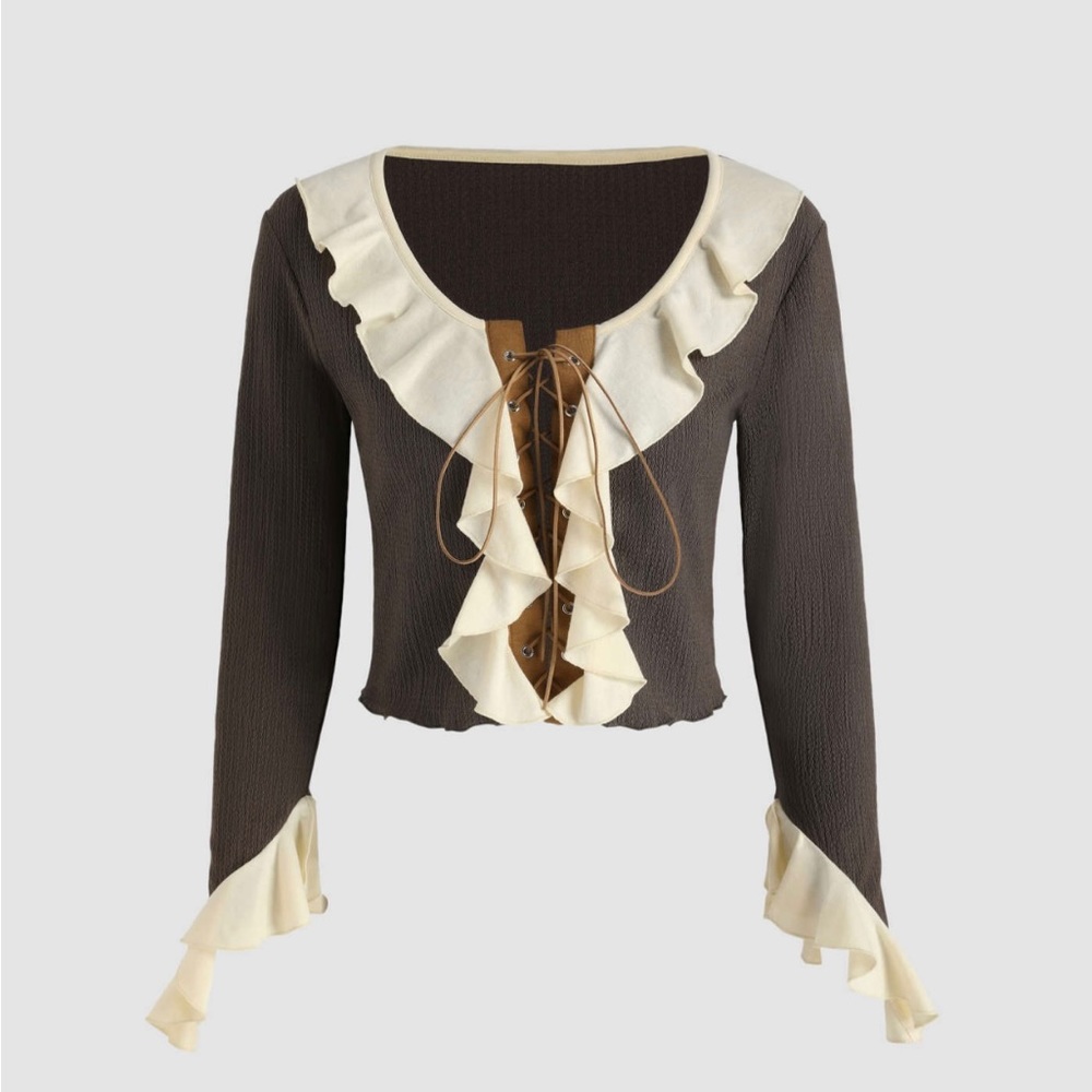 Lace up ruffle blouse with asymetric sleeves